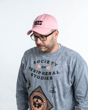 Meow Wolf Black Logo Pink Dad Hat
